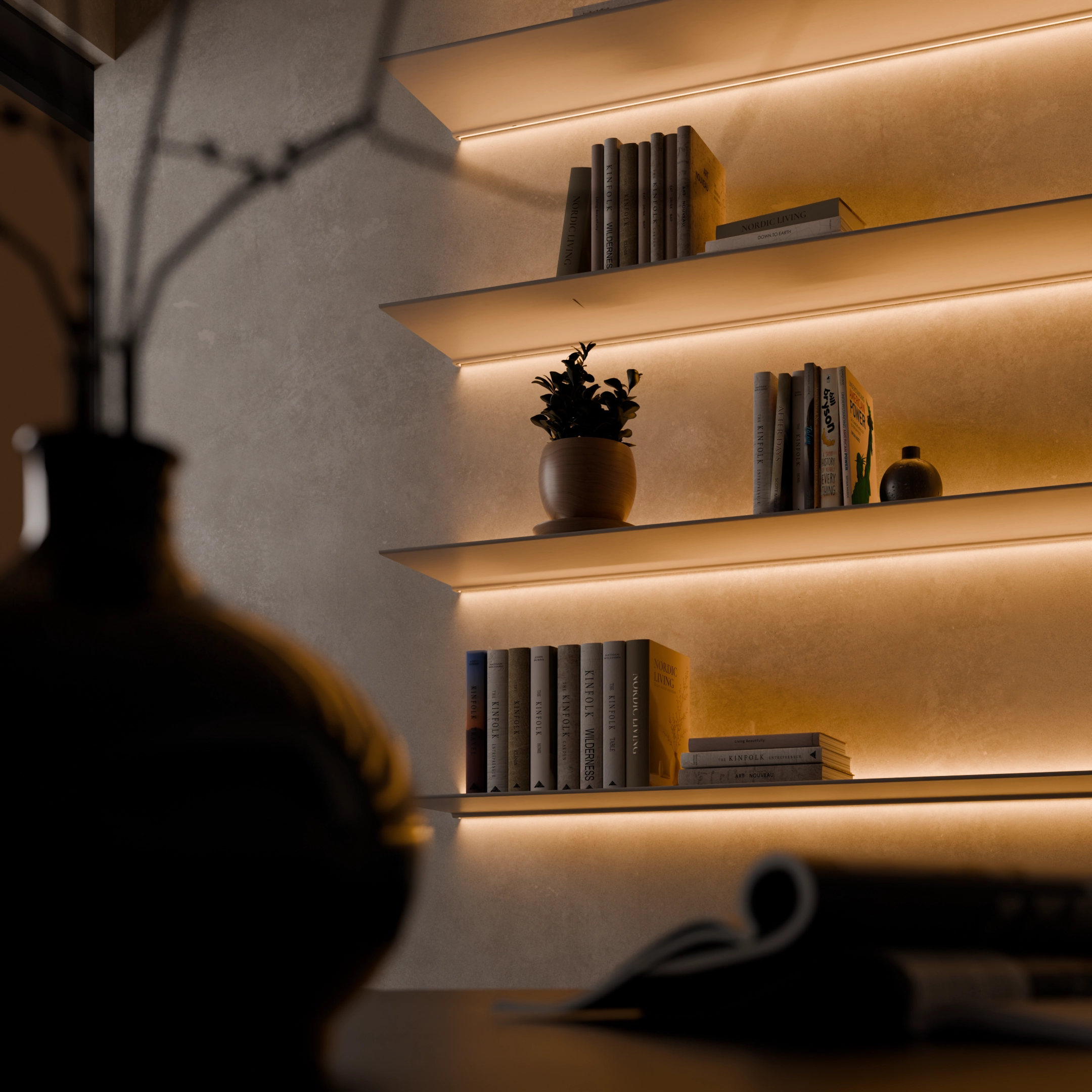 Gave aluminium boekenplank gezien vanaf het oppervlak van een tafel tijdens zonsondergang.
